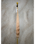 Four bundles of golden blond with dark roots body wavy bulk hair arranged together.