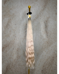 Four bundles of light blond with dark roots body wavy bulk hair arranged together.